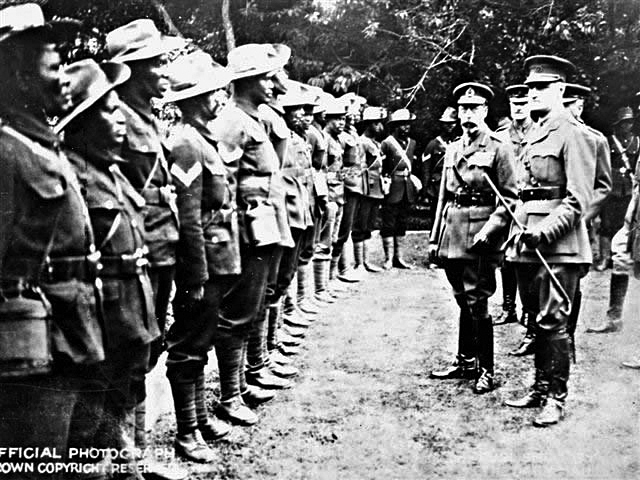 Men of the South African Labour Corps are inspected by King George V
